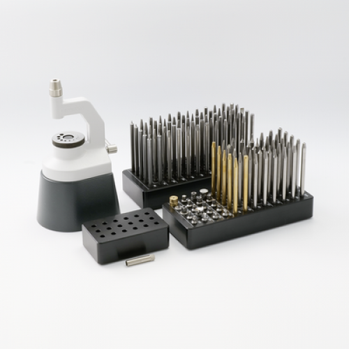 Triebnietmaschine Bergeon, Sockel, 100 Punzen, 20 Amboss, im Koffer